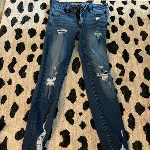 American Eagle Mid Rise Jeggings with rips